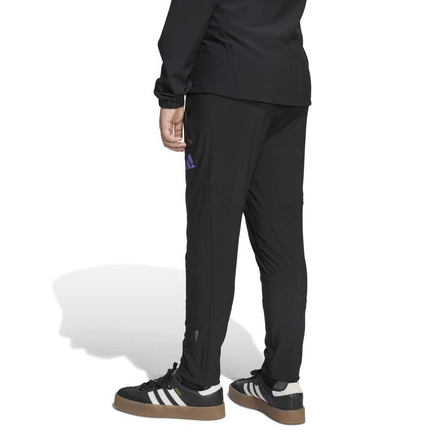 Manchester United Training Trousers Tiro 25 Competition Vis Tech Travel - Black/Purple Rush Kids-SoccerKits Hub | Buy Soccer Jerseys Online
